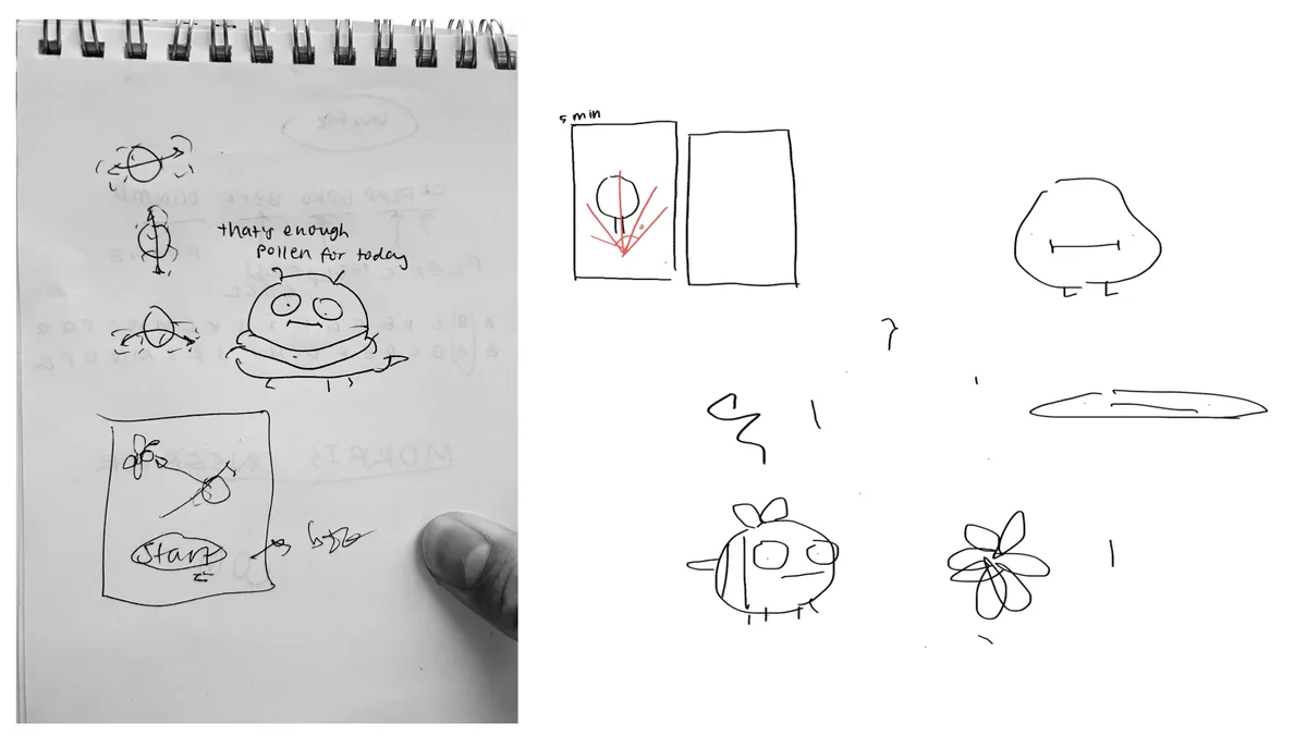 A black-and-white photo shows a spiral-bound sketchbook with doodles of a cartoon character resembling a pollen-covered bug…