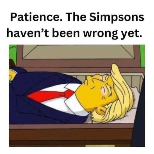 A cartoon image shows a yellow-skinned man with blonde hair, wearing a blue suit and red tie, lying in a coffin with his…