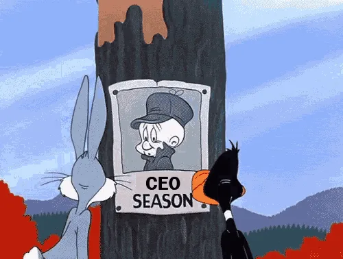 A Looney Tunes cartoon strip shows Bugs Bunny and Daffy Duck looking at a wanted poster for a man labeled 'CEO SEASON'. In…