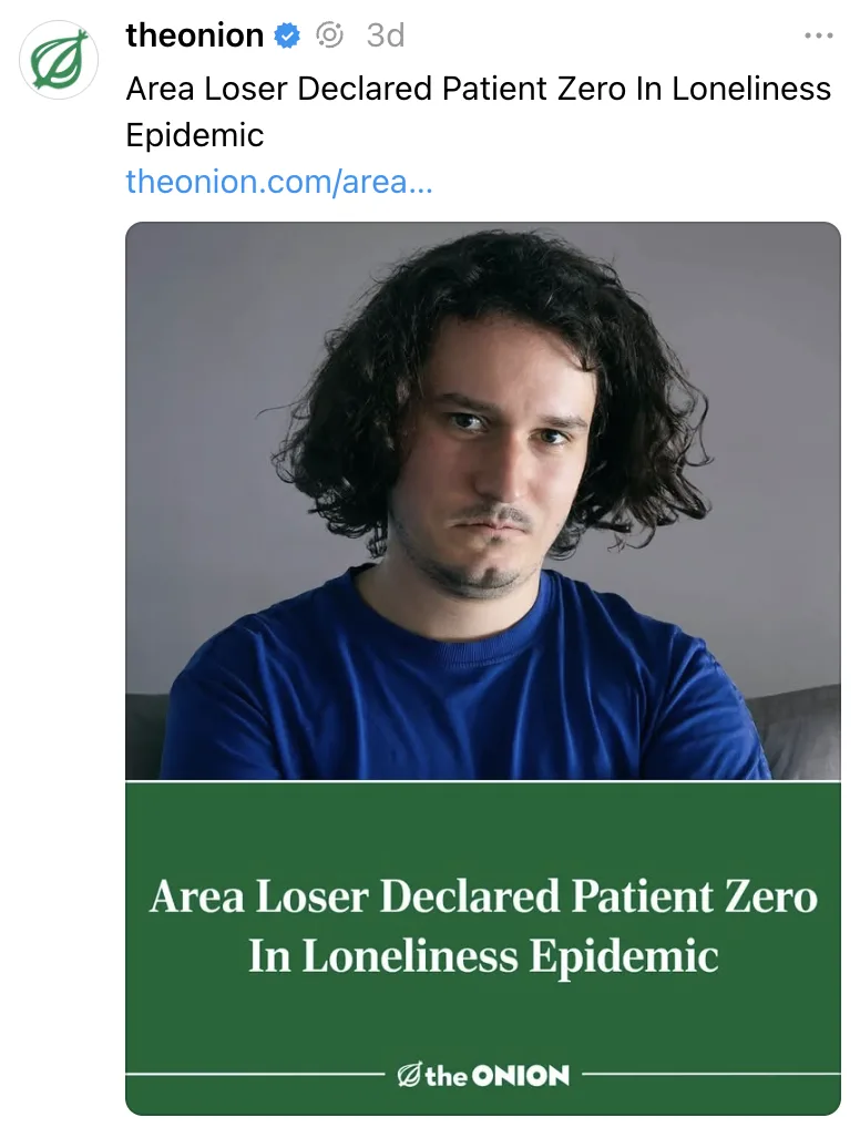 A screenshot of a The Onion article featuring a photo of a man with dark curly hair and a blue shirt looking directly at the…
