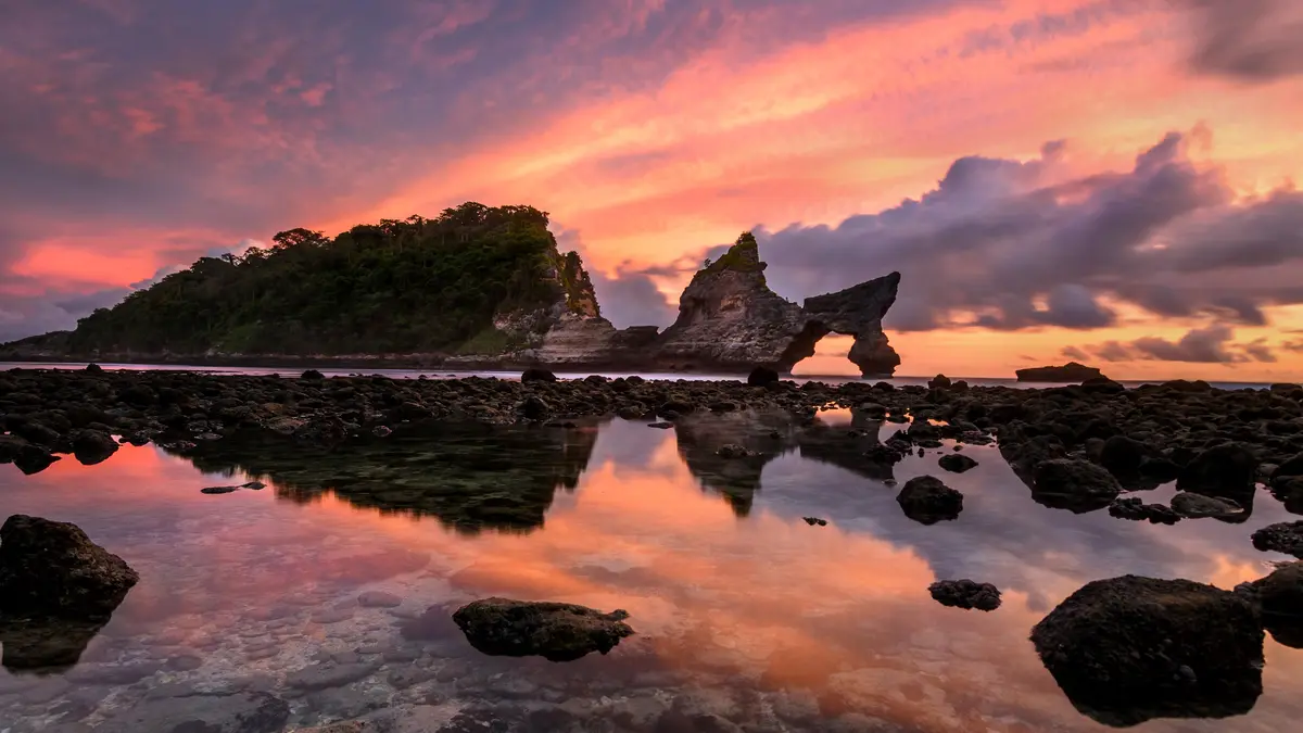 Bali's sunrise brings a serene start to the day on Nusa Penida, a tranquil island in Indonesia's Bali province. Enjoy a…