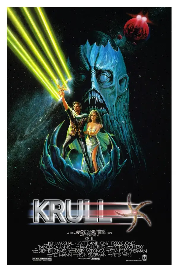 A movie poster for the 1983 film 'Krull' shows a giant blue alien face with sharp teeth and glowing eyes, holding two humans…