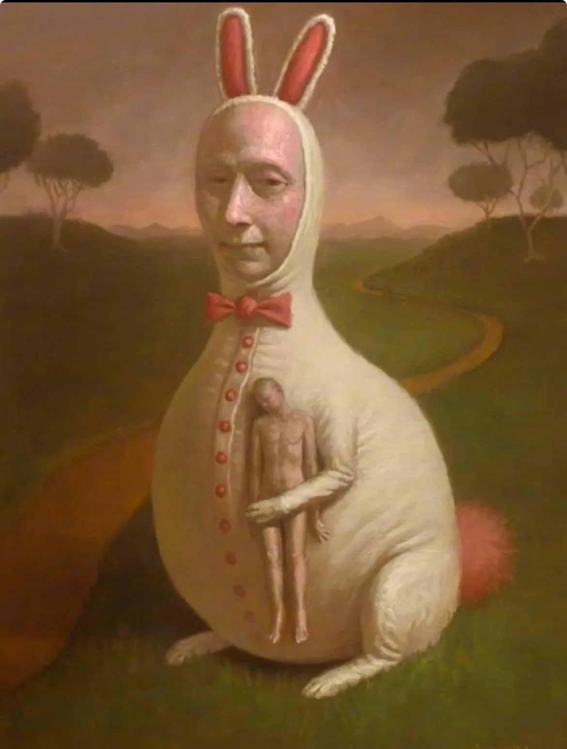 A surreal painting depicts a man wearing a white rabbit costume with red ears and a red bowtie, sitting in a grassy field…
