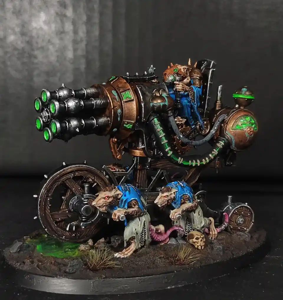 A highly detailed, painted miniature of a rat-like creature riding a steampunk-style motorcycle equipped with a large…