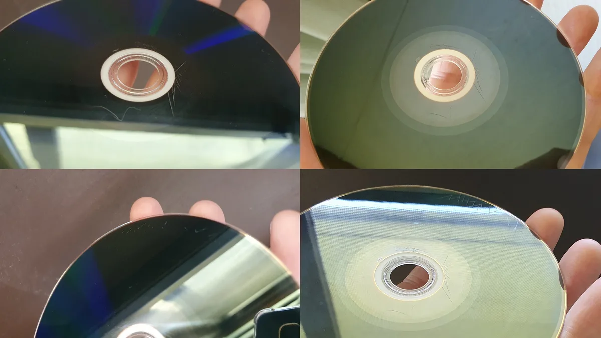 A four-panel image collage shows a hand holding a scratched CD from various angles, highlighting its reflective surface and…