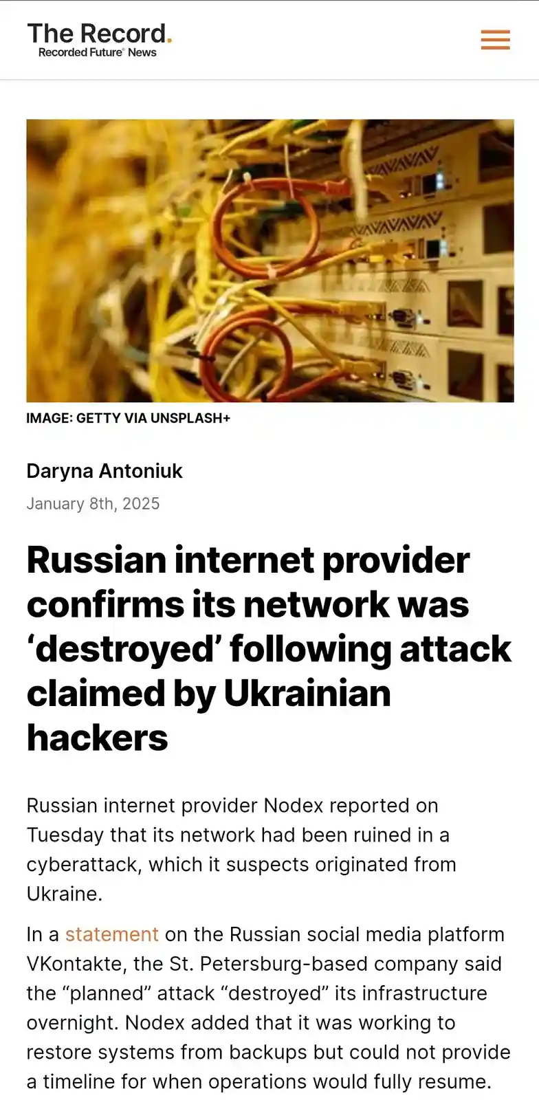 A screenshot of a news article from 'The Record' dated January 8th, 2025, featuring a photo of tangled network cables and…