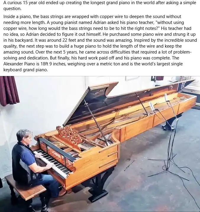 A man with gray hair sits on a wooden bench playing an extremely long, custom-built grand piano made of light-colored wood…