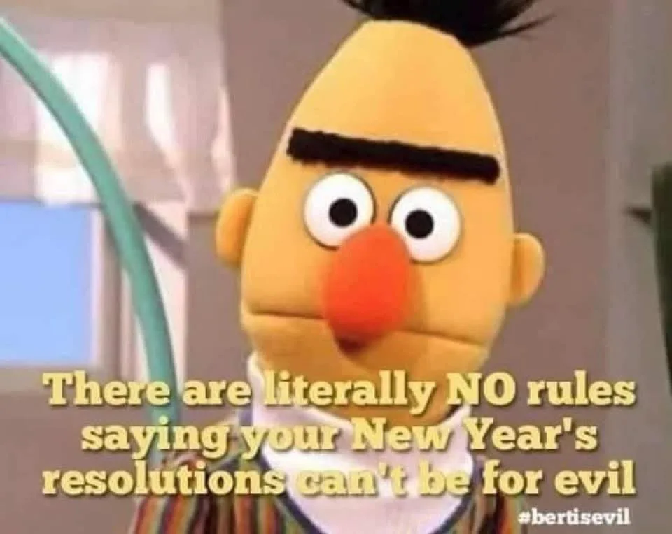 A close-up image of the Muppet character Bert, who has a stern, slightly smug expression with one eyebrow raised. He has his…