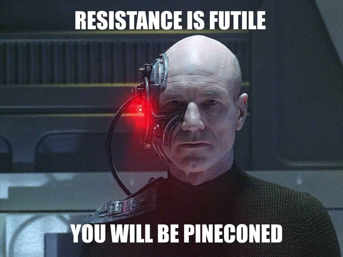 A bald man with a cybernetic eye glowing red, wearing a dark uniform, stares intensely. White bold text at the top reads…