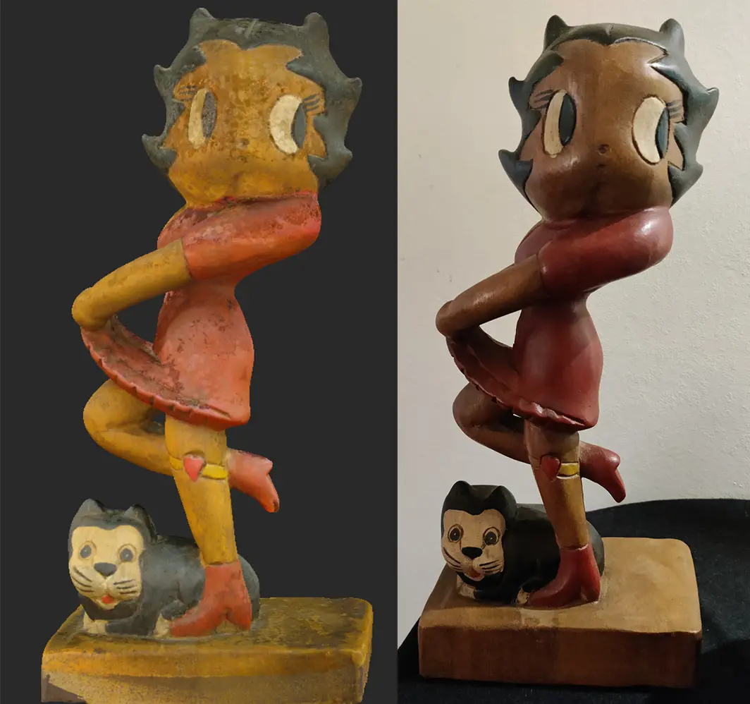 The image displays two side-by-side photos of the same vintage wooden Betty Boop figurine, showing a dramatic…