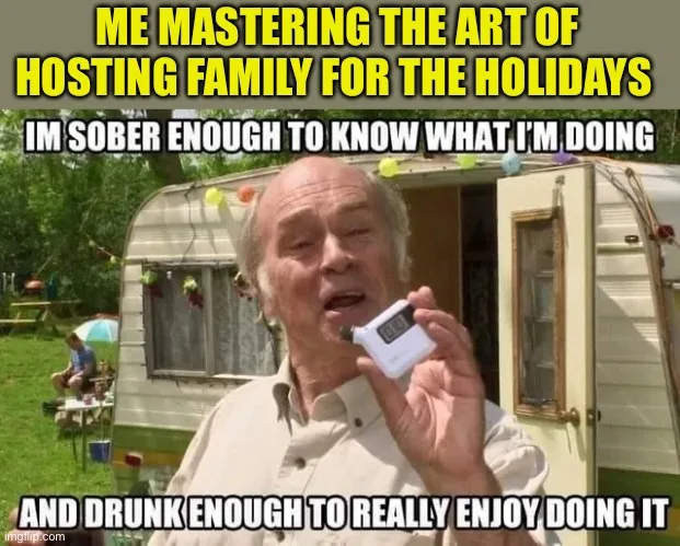 An older man with a surprised expression holds up a small digital alcohol breathalyzer in front of a camper trailer. The…