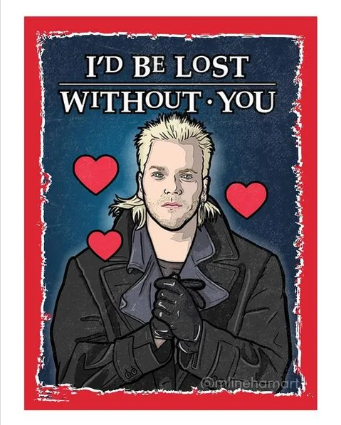 An illustrated portrait of a man with blonde hair and a black coat, surrounded by three red hearts, with the text 'I'D BE…