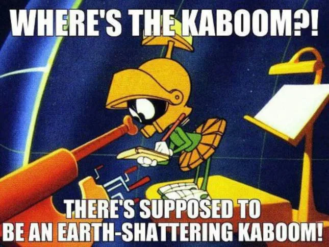 A cartoon robot with a yellow helmet and green body is shown holding a large orange cannon, looking frustrated. The…