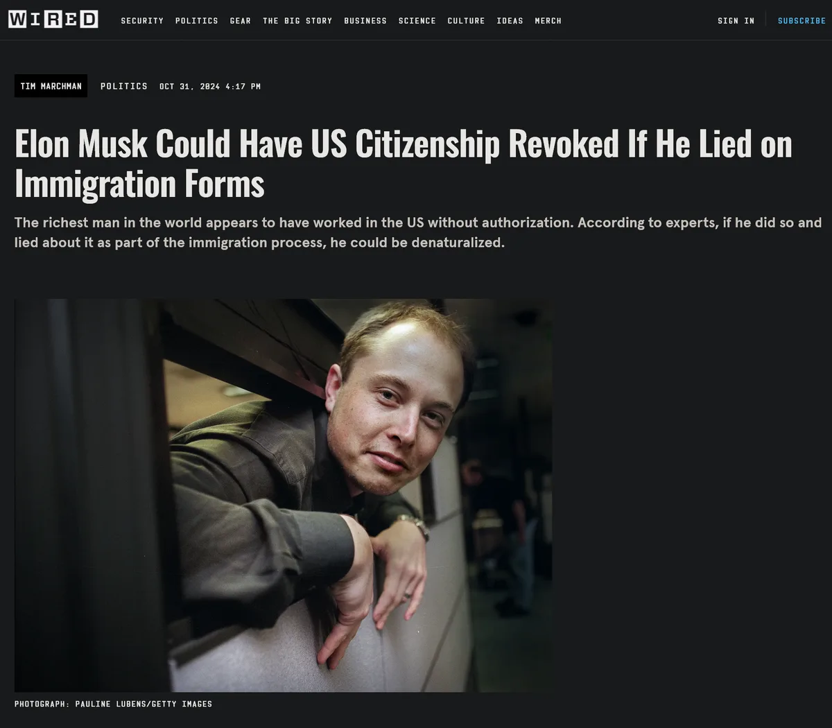 A screenshot of a Wired news article from October 31, 2024, featuring a photo of Elon Musk looking over a cubicle wall. The…