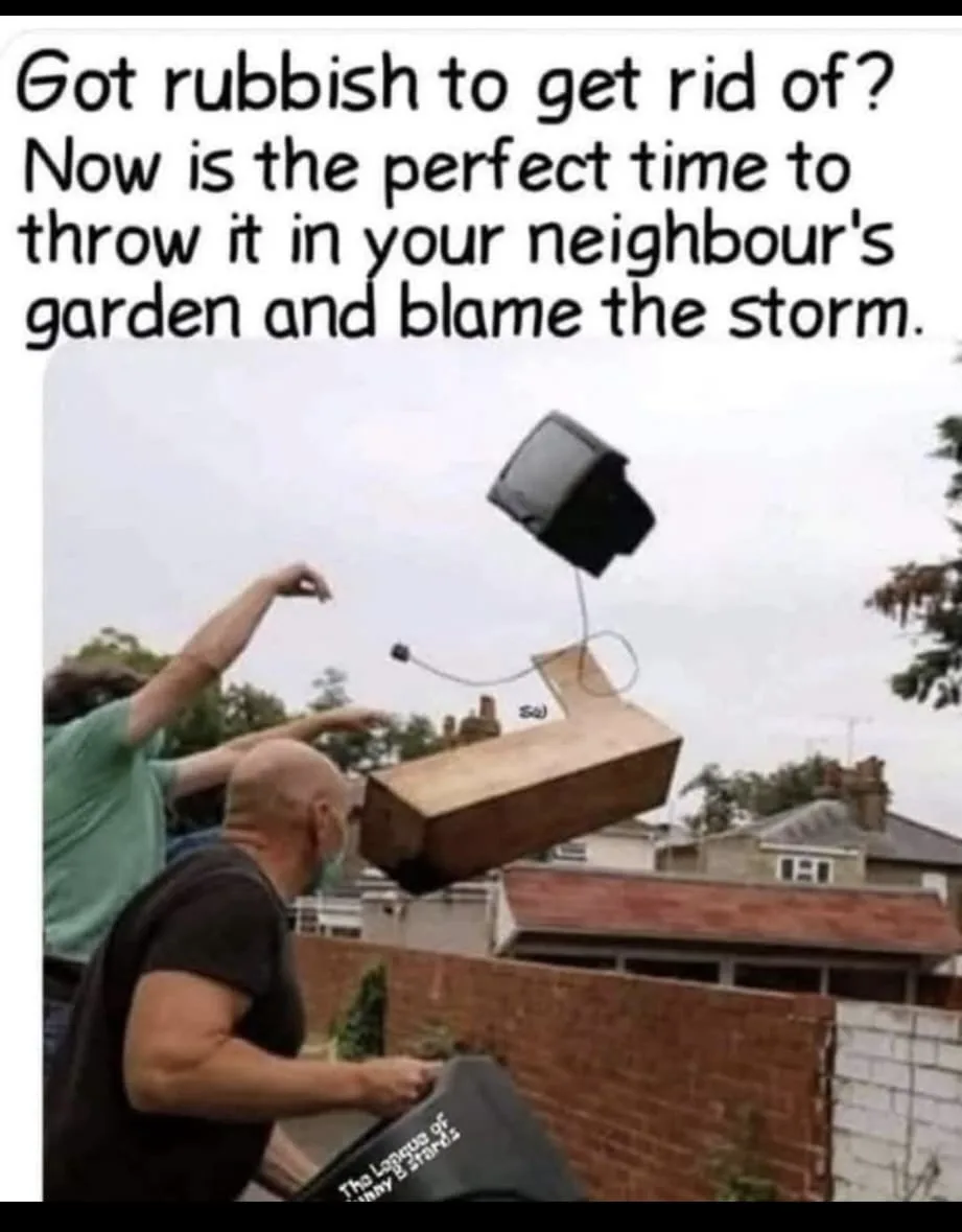 Two people are shown throwing a large, old television set over a brick wall into a garden. The text overlaid on the image…