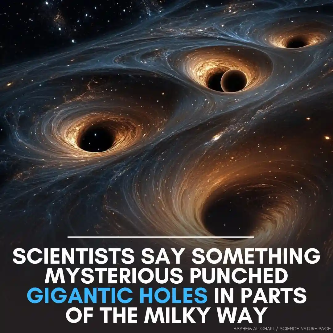 The image shows a cosmic scene with multiple black holes swirling in space, surrounded by glowing accretion disks and stars…