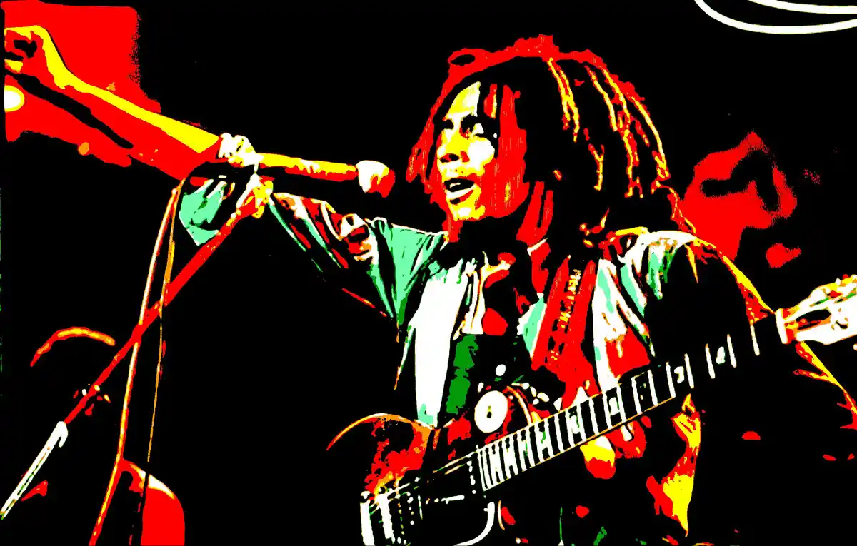 A high-contrast, stylized image of a musician with dreadlocks, holding a microphone in one hand and a guitar in the other…