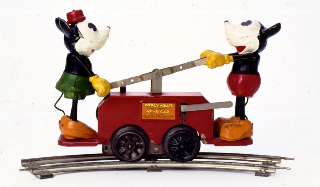 A vintage gem: Lionel, Mickey, and Minnie on a handcar from 1934!