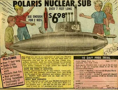 An old-fashioned, colorful print advertisement for a toy called the 'Polaris Nuclear Sub,' priced at $698 and advertised as…