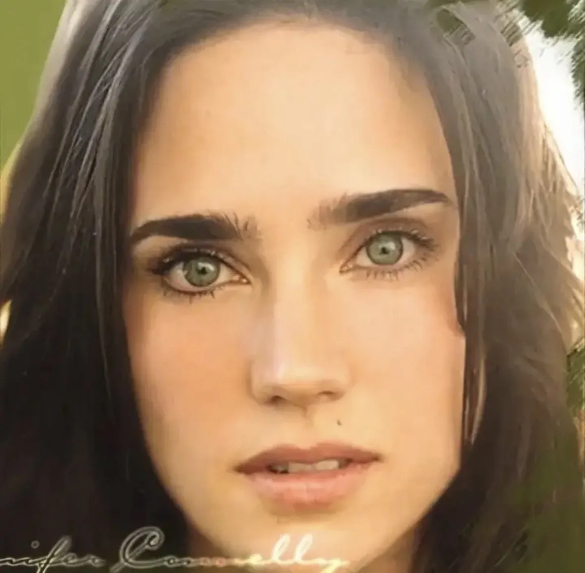 A close-up portrait of actress Jennifer Connelly with dark hair and green eyes, looking directly at the camera. The image…