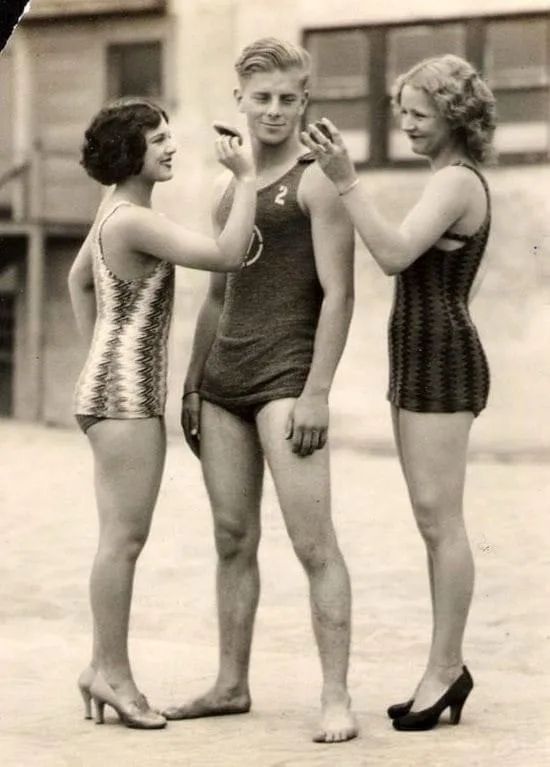 A Glimpse of History: Lifeguard Pampered by Two Women at Venice Beach, 1927