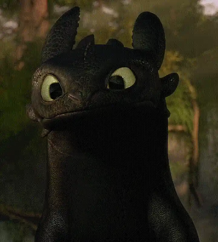 a six-panel grid shows the dragon Toothless from How to Train Your Dragon, starting with a neutral expression, then licking…