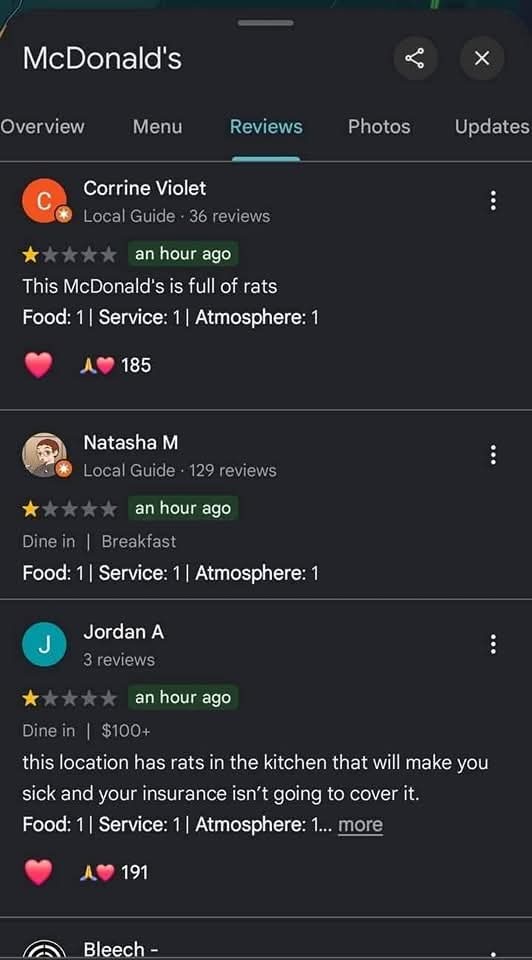 A screenshot of a dark-themed Google Maps review page for McDonald's, showing three one-star reviews from 'Local Guide'…