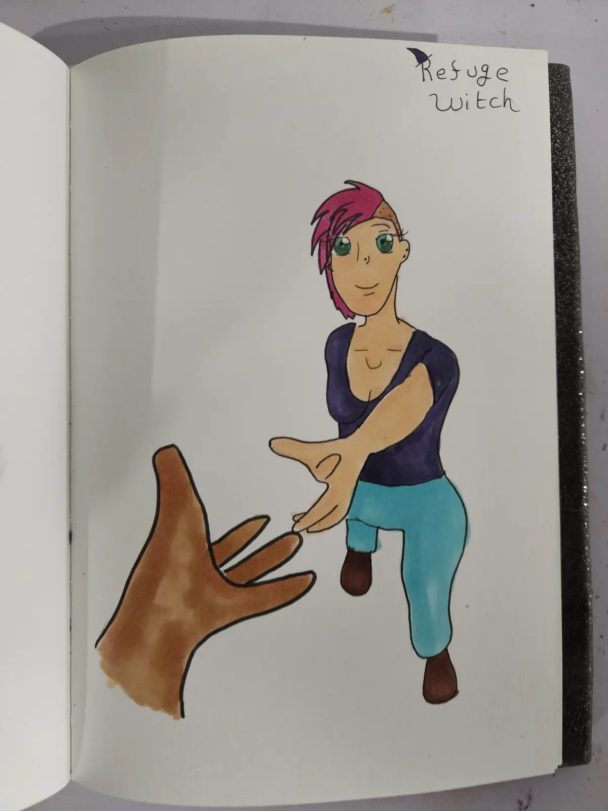 A hand-drawn illustration in a sketchbook shows a person with pink hair and green eyes, wearing a dark top and blue pants…