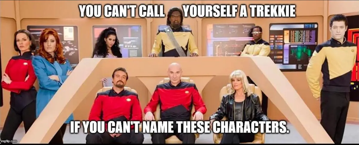 The image shows the main cast of Star Trek: The Next Generation in their iconic uniforms, posed in the ship's bridge. The…