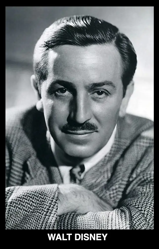 A black-and-white portrait of Walt Disney, who has a mustache and is wearing a textured suit jacket over a collared shirt…