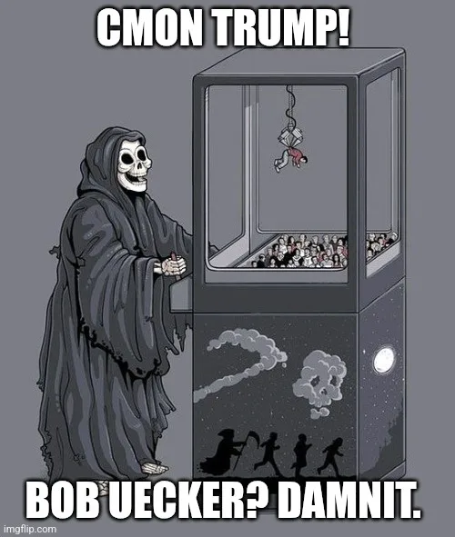 A grim reaper stands beside a claw machine filled with small figures, looking frustrated as a person hangs from the claw…