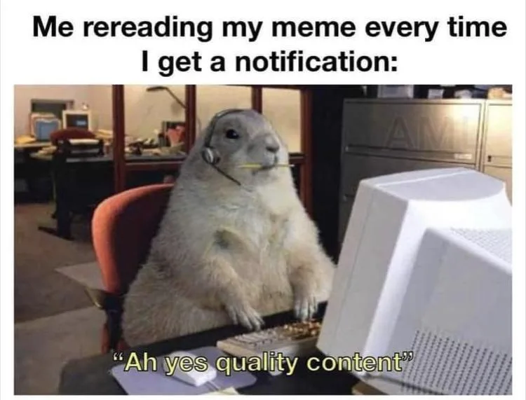 A prairie dog wearing a headset and holding a pen in its mouth sits at a desk with a vintage computer monitor, keyboard, and…