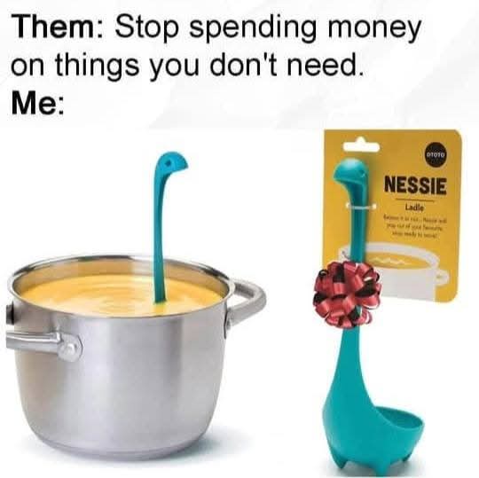 An image shows a teal dinosaur-shaped ladle, labeled 'NESSIE Ladle' on its packaging, inserted into a pot of soup. The ladle…