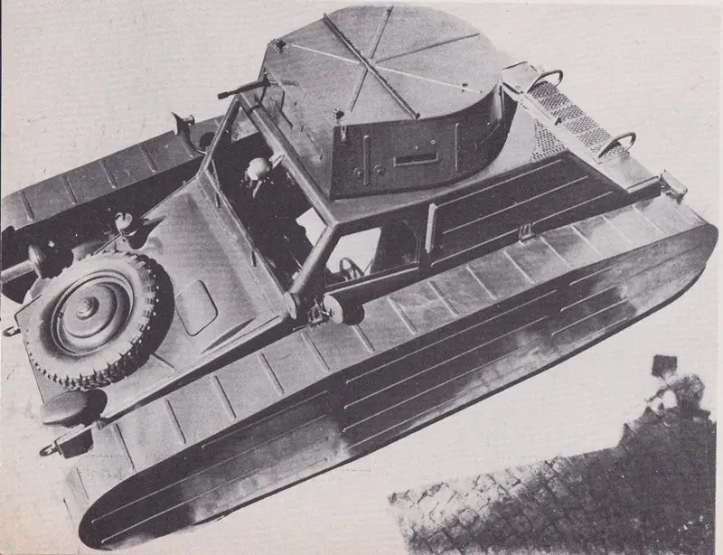 a black and white photograph shows a military vehicle with tank-like tracks and a turret, but it is depicted floating in…