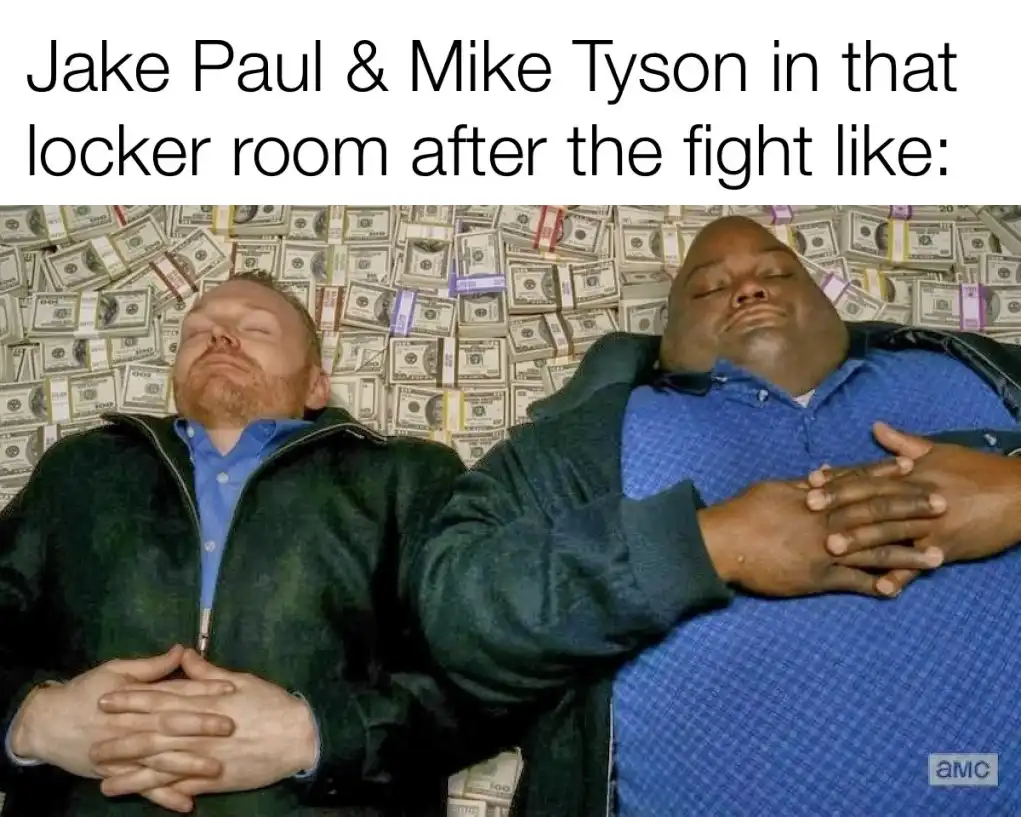 Two men, identified as Jake Paul and Mike Tyson by the text, are lying down with eyes closed, appearing to be asleep or…