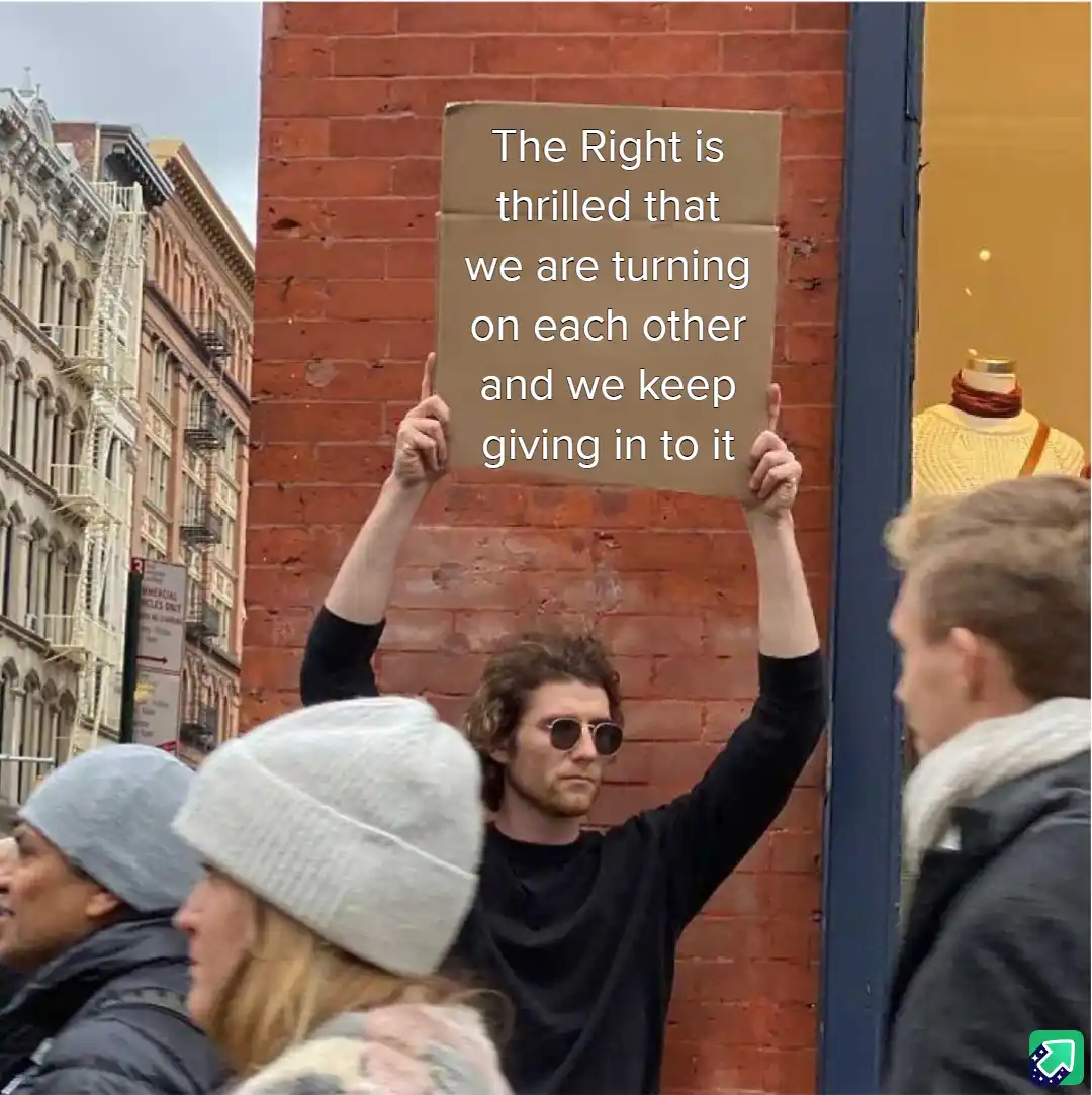 A man with curly hair and sunglasses holds up a cardboard sign with white text that reads 'The Right is thrilled that we are…