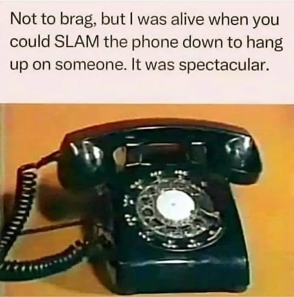 A black rotary telephone sits on a wooden surface, its handset resting on the cradle. The overlaid text reads: 'Not to brag…