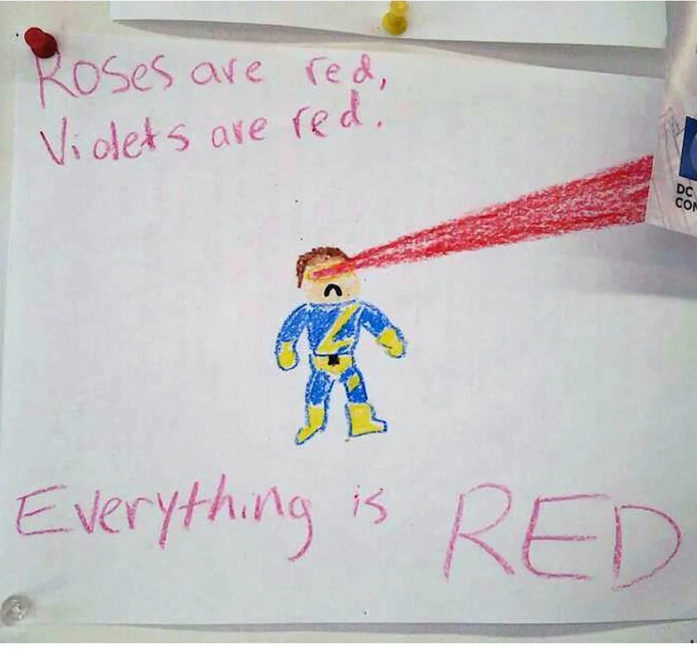 A child's crayon drawing on paper shows a blue and yellow superhero with a red laser beam shooting from his eye. Above the…