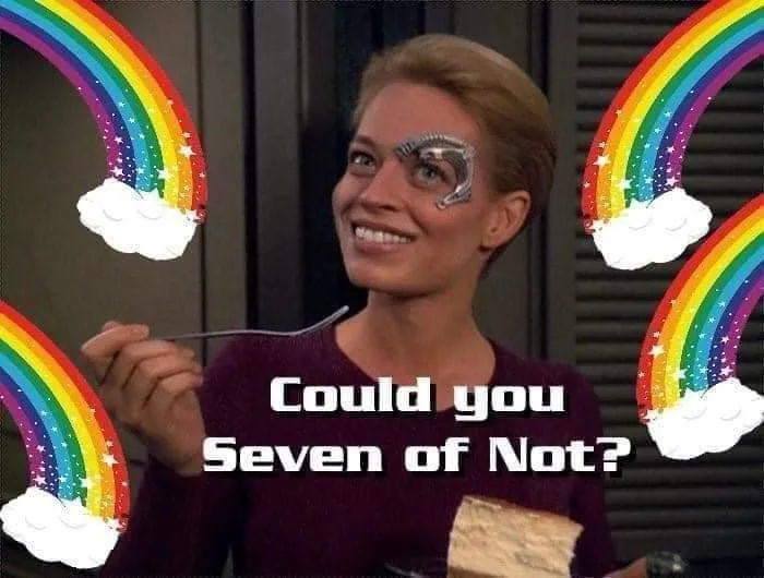 A woman with glittery eye makeup smiles while holding a spoon and a piece of cake, surrounded by cartoon rainbows and…