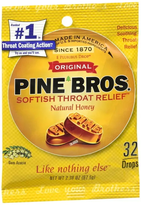 A yellow package of Pine Bros. Softish Throat Relief drops, featuring embossed drops with 'PINE' on them, a 'Ranked #1 in…