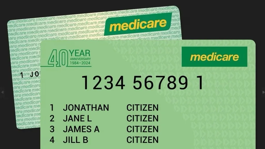 Two green Medicare cards are shown, one partially behind the other. The front card displays '40 YEAR ANNIVERSARY 1984-2024'…