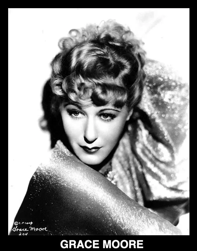 A vintage black-and-white portrait of actress Grace Moore, featuring her in glamorous attire with curled hair, looking…