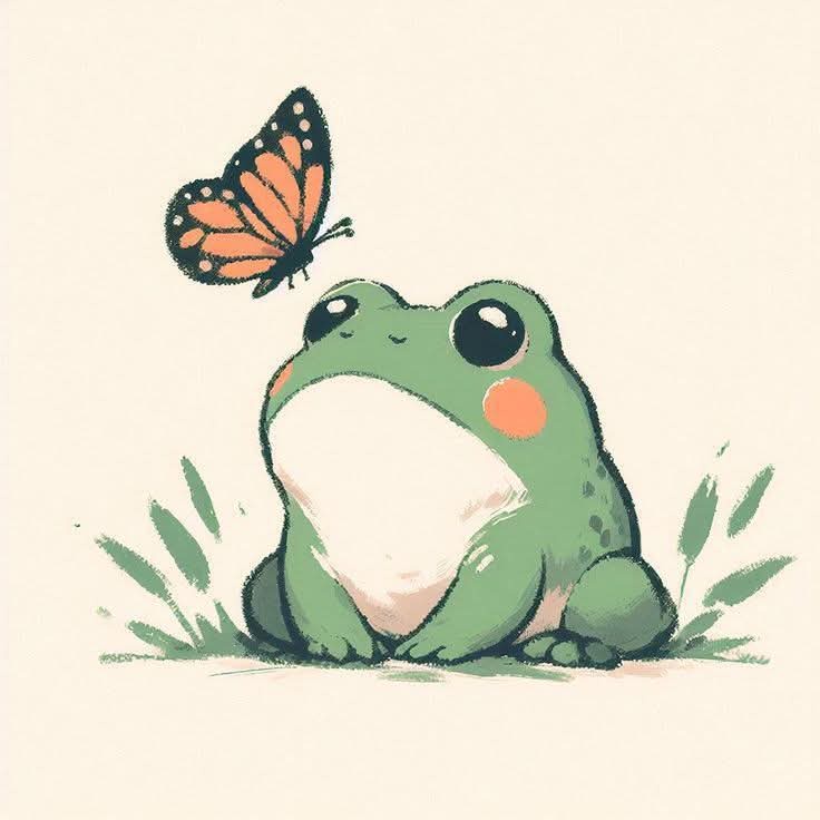 A cute, cartoon-style green frog with large eyes and orange cheeks sits on the ground surrounded by sparse green grass. A…