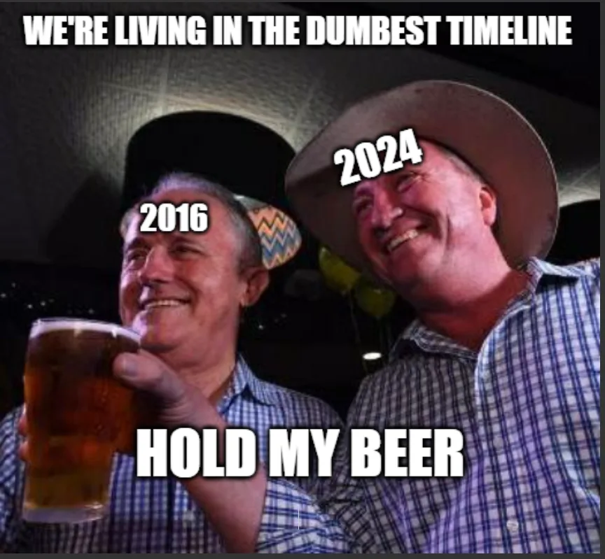 Two smiling men in plaid shirts are shown in a dimly lit bar setting, one holding a beer glass. The man on the left is…