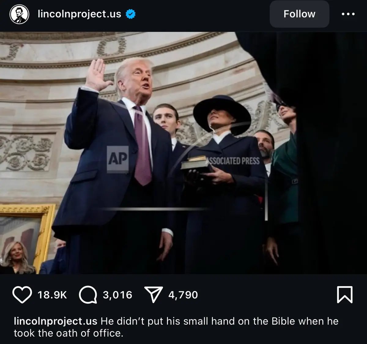 A photo of Donald Trump raising his right hand while taking the presidential oath of office, with his left hand not touching…