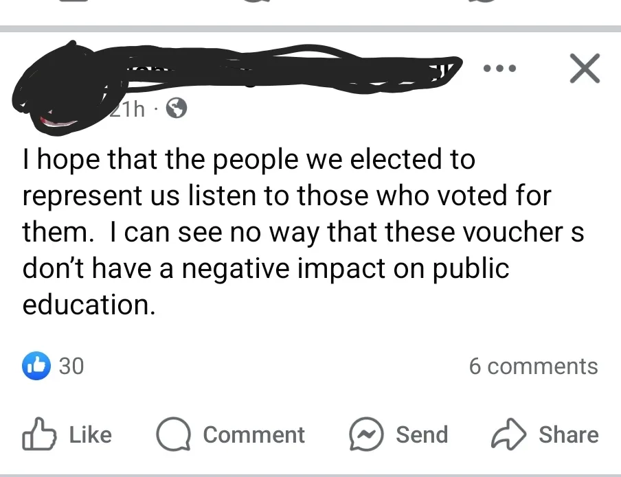 A screenshot of a Facebook post with the poster's profile picture and name obscured by black scribbles. The post text…