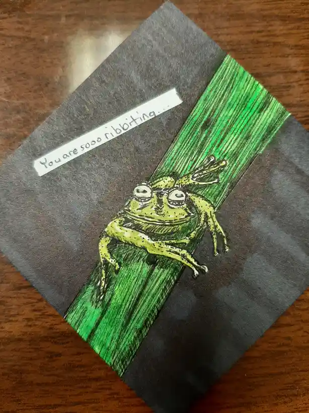 A hand-drawn illustration of a green frog with large eyes perched on a green stalk against a dark grey background, with a…