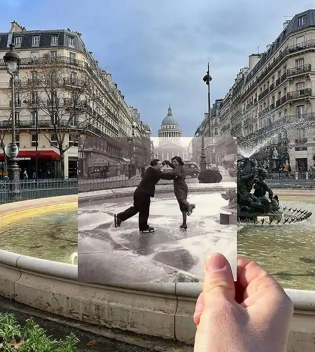 A hand holds a black-and-white photograph of a couple ice skating in front of a fountain, superimposed over a modern color…