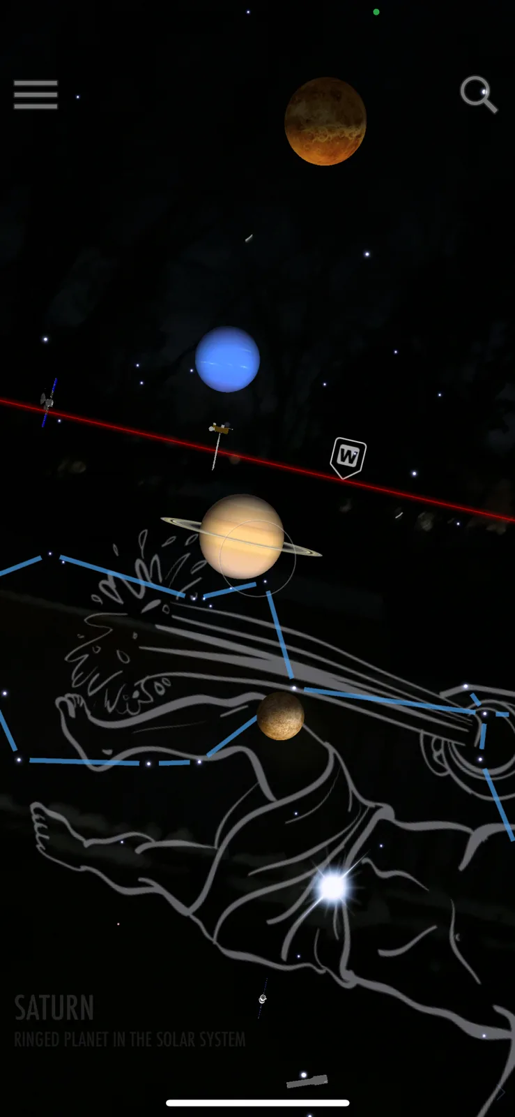 A screenshot from a planetarium app shows Saturn with its rings, overlaid on a faint white line drawing of a reclining human…