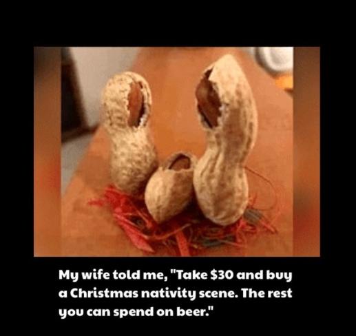 Three shelled peanuts are arranged upright on red shredded paper, resembling a nativity scene. The overlaid text reads: 'My…